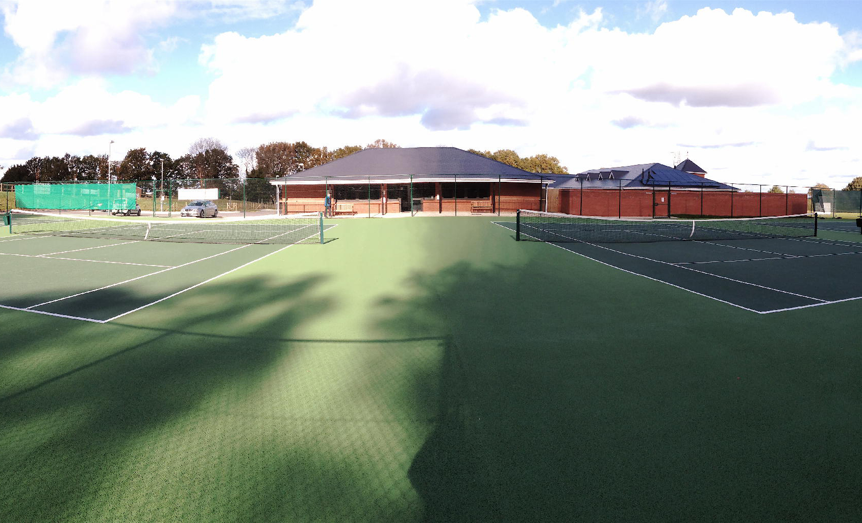Wide Angle Photo Of Empty Tennis Courts