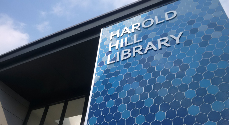 Harold Hill Library Logo On The Side Of A Building