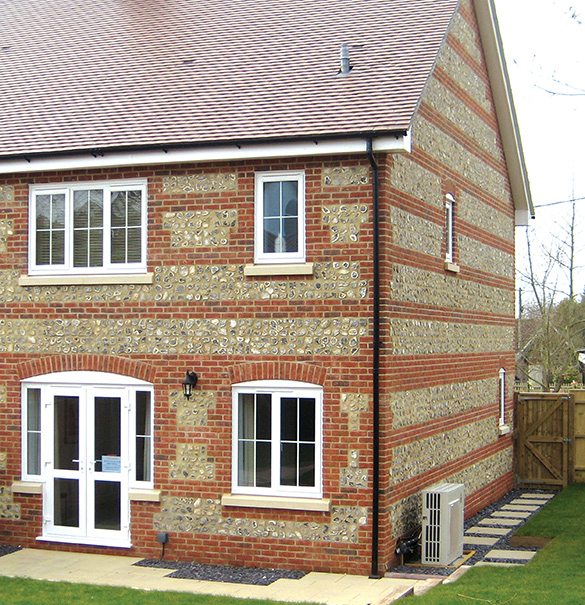 Front Of House With Air Source Heat Pump