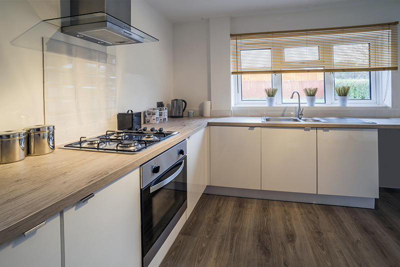 White Kitchen With Wooden Worktops