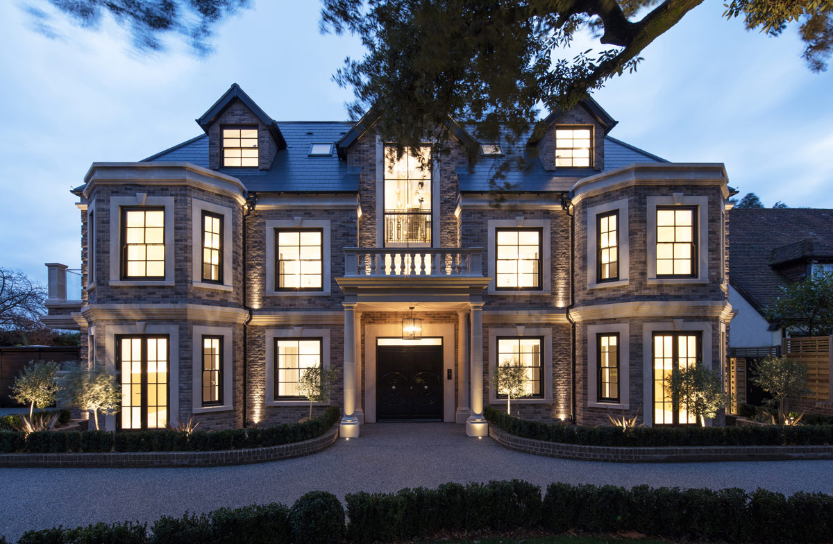 Pentagon House With All Lights On At Night