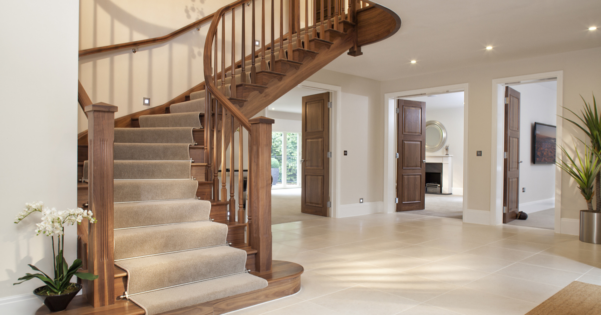 Hallway with wooden stairs and open plan