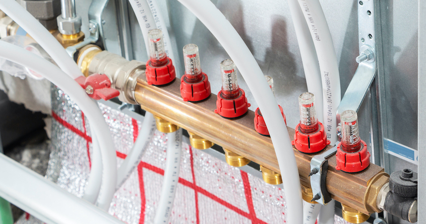 Picture of an Actuator on an underfloor heating system